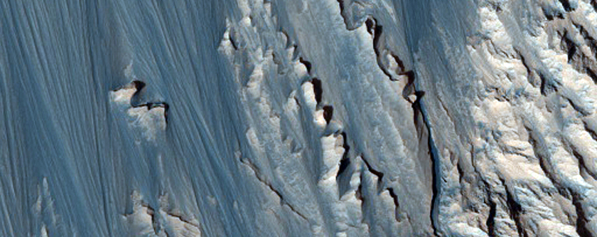 Light-Toned Stratified Materials in Hebes Chasma