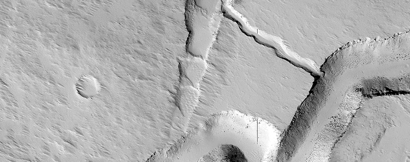 Intersecting Rilles on East Slope of Pavonis Mons