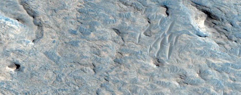 Sinuous and Linear Ridges in Light-Toned Material West of Meridiani Planum
