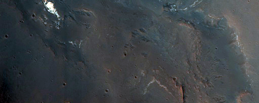 Light-Toned Layers Next to Fan in Depression North of Ganges Chasma