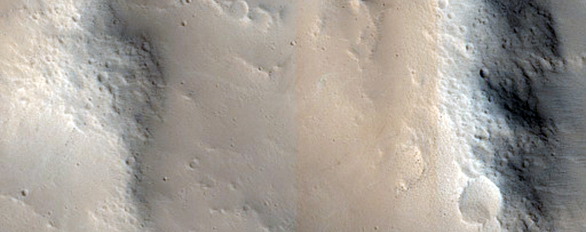 Central Peak of Crater at Edge of Pettit Crater Ejecta