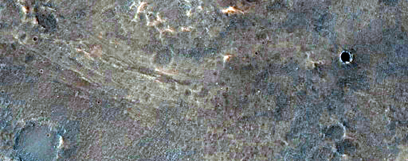 Possible Olivine-Rich Crater Ejecta in Solis Planum