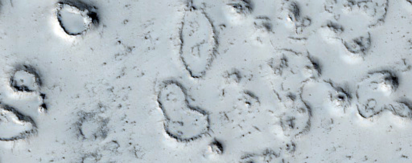 Cratered Cones in Tartarus Montes Region