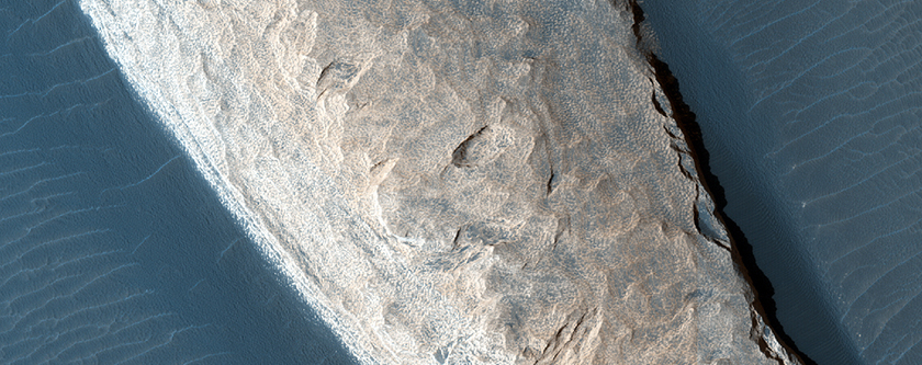 Pollack Crater Ripple Changes Near Feature Dubbed White Rock