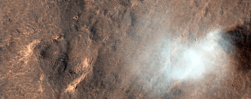 Transition from Continuous to Discontinuous Ejecta of Gratteri Crater