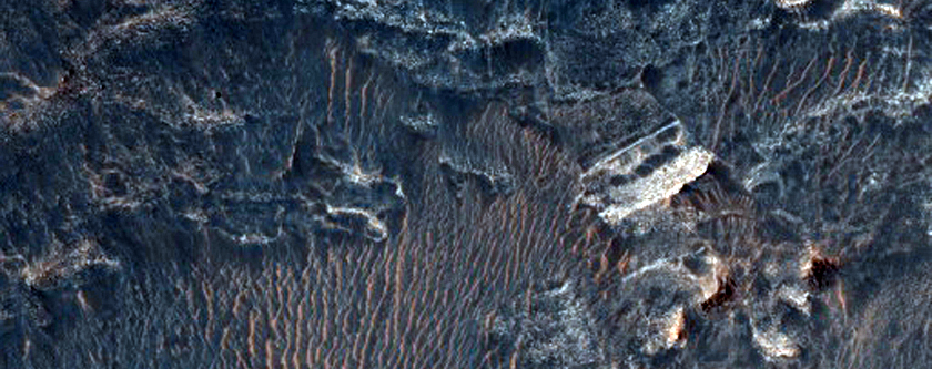 Contact between Light-Toned Deposits and Northern Melas Chasma Wallrock