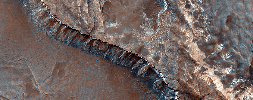 A Channel System and Patterned Ground near Hellas Basin