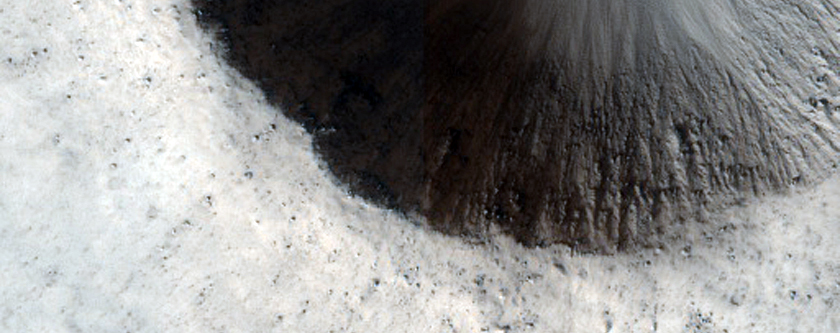 Small Well-Preserved Crater with Ejecta in Amazonis Region