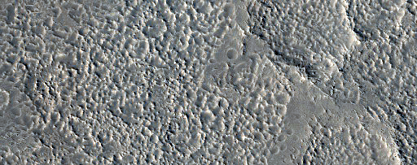 Valley Entering Northern Mid-Latitude Crater