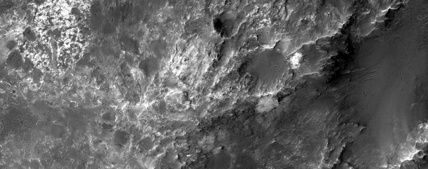 Crater North of Hellas Planitia with Possible Phyllosilicates in Ejecta