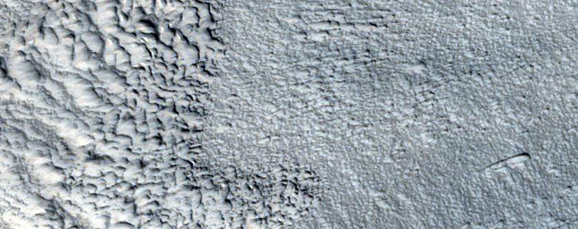 Surface Features Emanating from Alcove in Deuteronilus Mensae