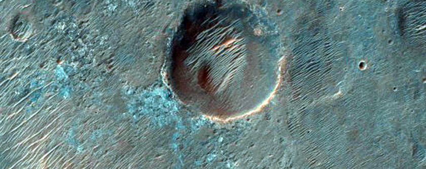 Ancient Bedrock Exposed in Rim of Roddy Crater