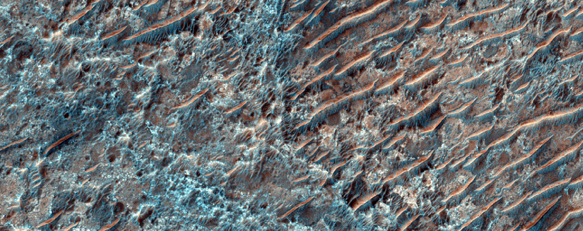 Possible Olivine-Bearing Material within Huygens Crater