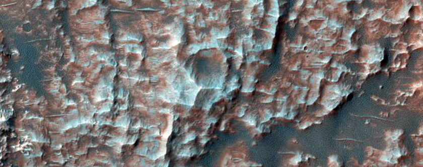 Dunes Marching Across Well-Preserved Crater Ejecta