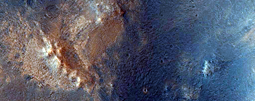 Impact Crater Exposing Bedrock