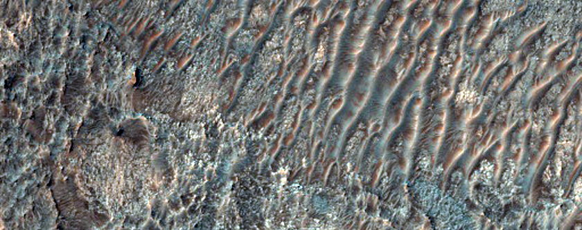 Mesa and Butte-Forming Materials in the Terra Sabaea