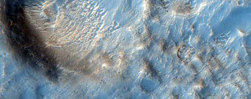 Polygonal Fracturing on Ejecta from Crater in Arabia Region