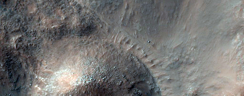 Central Uplift of 46-Kilometer Crater Near Ladon Valles Basin
