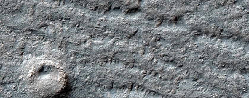 125-Meter Possible Crater on the South Polar Layered Deposits