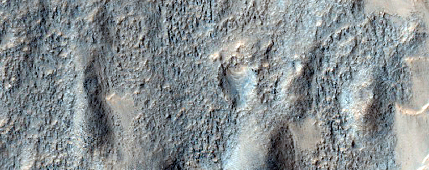 Contact between Isidis Planitia Olivine-Rich Unit and Ejecta of Crater