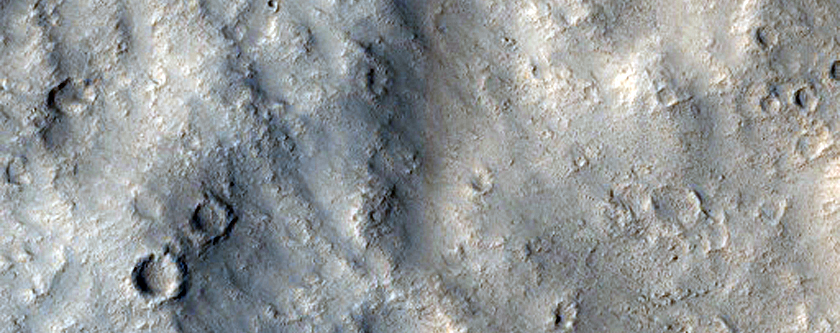 Pettit Crater Ejecta in Contact with Knobs and Massifs