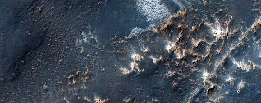 Light-Toned Deposits within Noctis Labyrinthus Graben