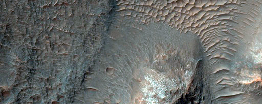 Fractured Crater in Ladon Valles Basin