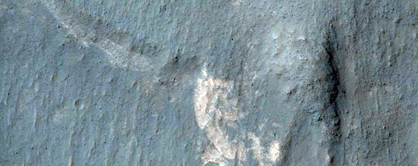 Contact between Light-Toned Deposits and Wallrock in Northern Melas Chasma