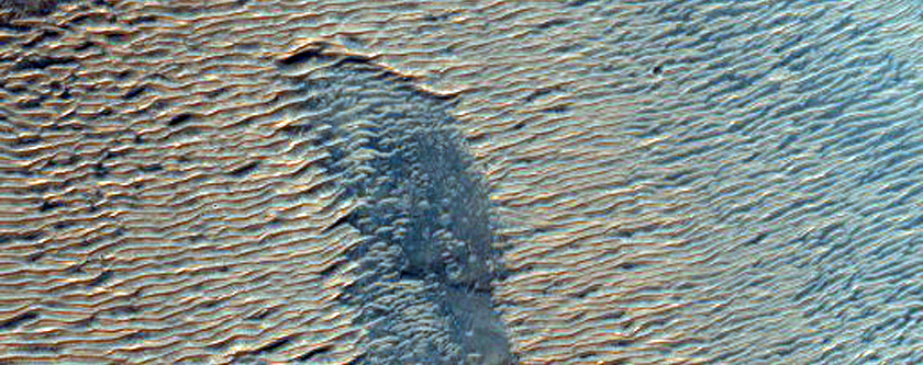 Light-Toned Materials Exposed within Noctis Labyrinthus Hills