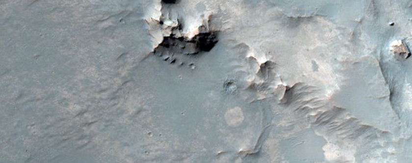 Outcrops in Pitted Plains Unit Northwest of Hellas Region