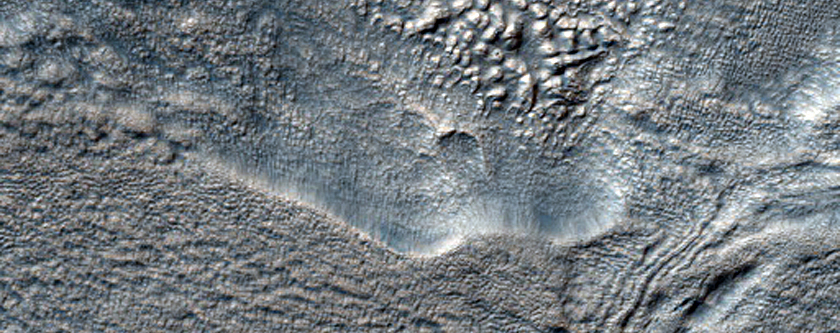 Impact Crater on Hellas Planitia Floor with Many Secondary Craters