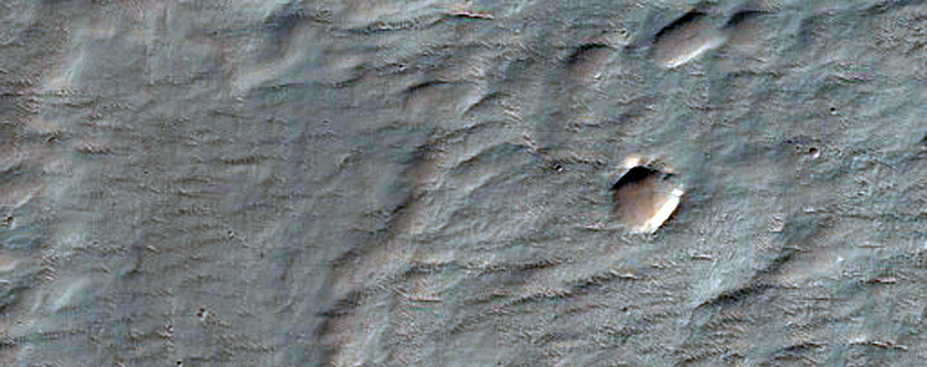 Channels and Fluidized Material Northeast of Hale Crater