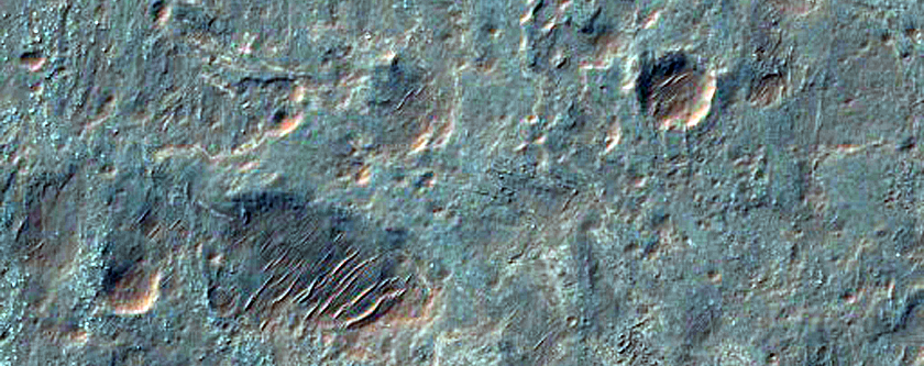 Fans Layers Channels on Floor of Roddy Crater 
