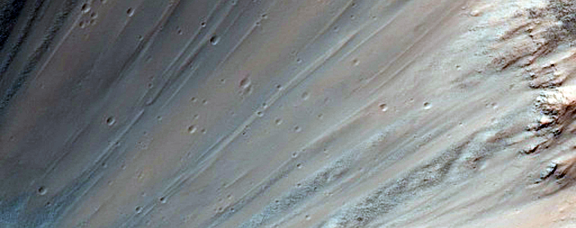 Small Crater in Rim of Larger Crater Southwest of Isidis Planitia
