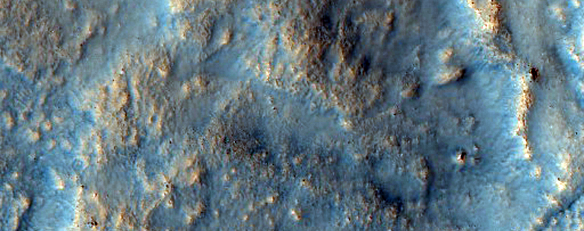 Pits in Crater Ejecta in Northern Arabia Terra
