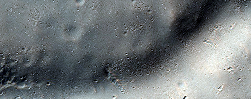 Pointed Crater in Claritas Fossae Region