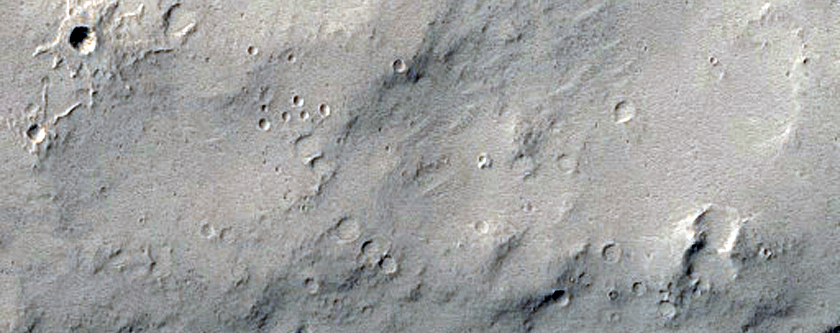 Valley with Inner Channel and Mesa-Forming Material Downslope
