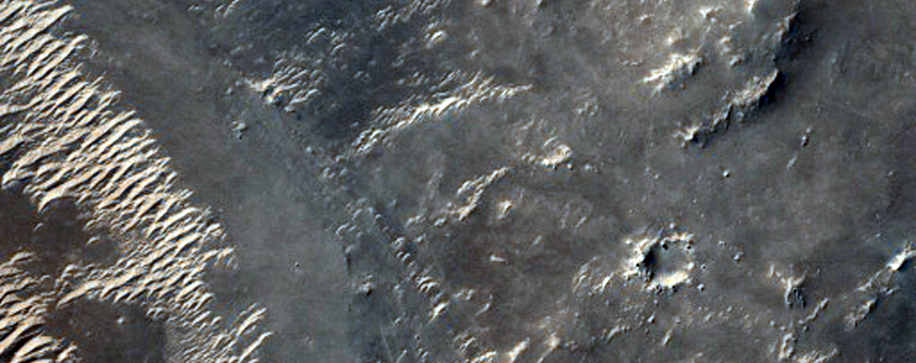Layers along Valley in Northeast Arabia Terra
