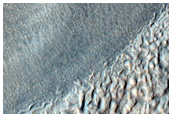 Debris Apron and Flow Features in Reull Vallis
