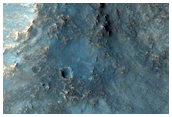 Impact Crater into Side of Massif