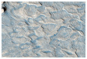 Sinus Meridiani and Meridiani Planum Stratigraphy