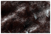 Possible Exposures of South Polar Layered Deposits