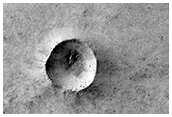 Monitor Seasonal Defrosting of Icy Crater