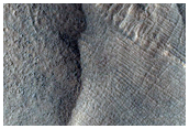 Debris Apron and Flow Features in Reull Vallis