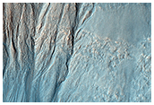 Gullies and Layers in a Crater near Mariner Crater