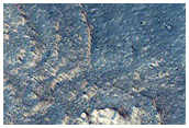 Light-Toned Layered Deposits along Noctis Labyrinthus Depression