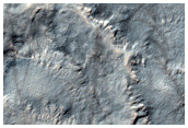 Crater in South Polar Layered Deposits