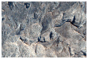 Layering in Melas Chasma