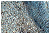 Intercrater Sinuous Valleys with Fan-Shaped Landforms at Their Termini