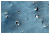 Possible Phyllosilicates in Ejecta of Crater Northeast of Huygens Crater
